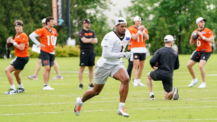 Cincinnati Bengals wide receiver Ja’Marr Chase (1) runs through drills during practice, Tuesday, May 13, 2025, at Kettering Health Practice Fields in Downtown Cincinnati.