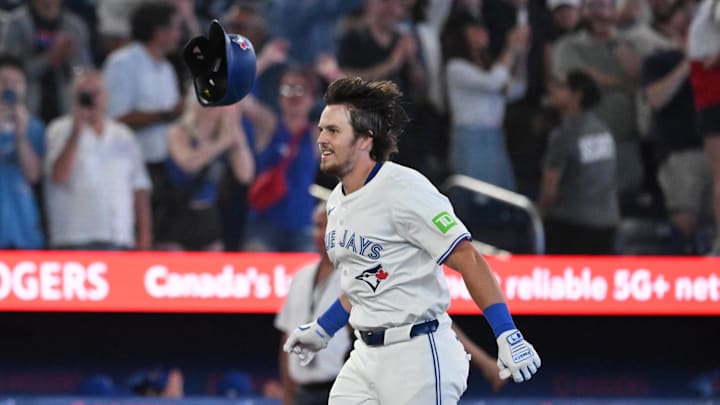 Jun 17, 2025; Toronto, Ontario, CAN;  Toronto Blue Jays right fielder Addison Barger (47) runs the bases after hitting a walk off solo home run against the Arizona Diamondbacks in the ninth inning at Rogers Centre.