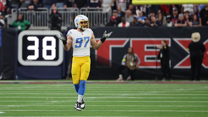 Jan 11, 2025; Houston, Texas, USA; Los Angeles Chargers outside linebacker Joey Bosa (97) reacts after sacking Houston Texans quarterback C.J. Stroud (7) (not pictured) in the first quarter in an AFC wild card game at NRG Stadium. Mandatory Credit: Thomas Shea-Imagn Images Jan 11, 2025; Houston, Texas, USA; Los Angeles Chargers outside linebacker Joey Bosa (97) reacts after sacking Houston Texans quarterback C.J. Stroud (7) (not pictured) in the first quarter in an AFC wild card game at NRG Stadium. Mandatory Credit: Thomas Shea-Imagn Images
