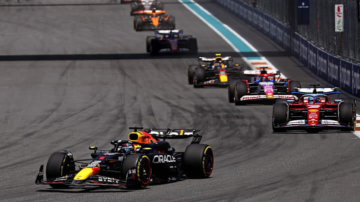 May 4, 2024; Miami Gardens, Florida, USA; Red Bull Racing driver Max Verstappen (1) lead the field into turn one during the F1 Sprint Race at Miami International Autodrome. Mandatory Credit: Peter Casey-Imagn Images