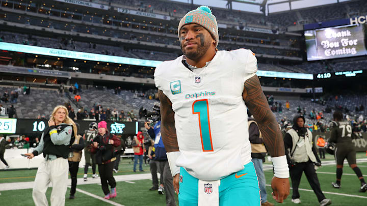 Miami Dolphins quarterback Tua Tagovailoa (1) walks on the field after the game against the New York Jets at MetLife Stadium in the 2025 season. Miami Dolphins quarterback Tua Tagovailoa (1) walks on the field after the game against the New York Jets at MetLife Stadium in the 2025 season.
