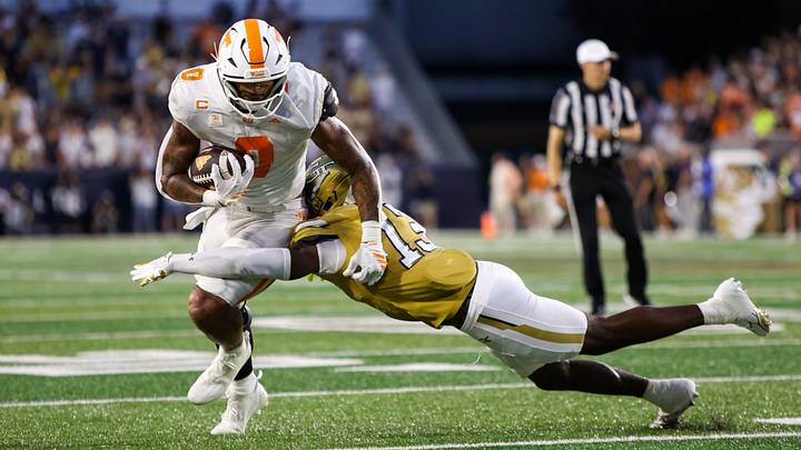 Sep 12, 2026; Atlanta, Georgia, USA; Tennessee Volunteers tight end Ethan Davis (0) is tackled by Georgia Tech Yellow Jackets safety Savion Riley (13) in the second quarter at Bobby Dodd Stadium at Hyundai Field. Mandatory Credit: Brett Davis-Imagn Images