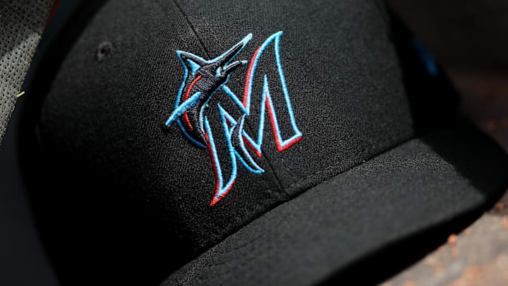 A view of a New Era Miami Marlins hat in the dugout during the game against the Cincinnati Reds at Great American Ball Park in Cincinnati on Apri 11, 2019.