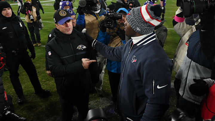 Jan 20, 2024; Baltimore, MD, USA; against the Baltimore Ravens head coach John Harbaugh (left) talks with Houston Texans head coach DeMeco Ryans (right) after a Ravens victory in a 2024 AFC divisional round game at M&T Bank Stadium. Mandatory Credit: Tommy Gilligan-Imagn Images
