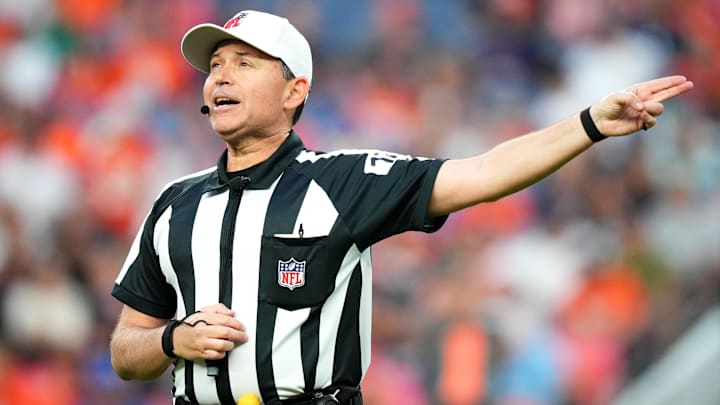 Aug 26, 2023; Denver, Colorado, USA; NFL referee Brad Allen (122) calls a personal foul penalty against the Los Angeles Rams during the first quarter at Empower Field at Mile High. Aug 26, 2023; Denver, Colorado, USA; NFL referee Brad Allen (122) calls a personal foul penalty against the Los Angeles Rams during the first quarter at Empower Field at Mile High.