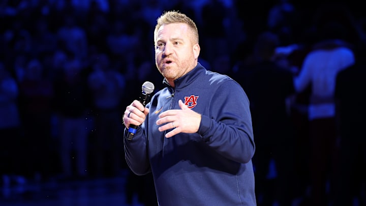 Dec 3, 2025; Auburn, Alabama, USA; Auburn Tigers head football coach Alex Golesh is introduced during the first half of a basketball game between the Auburn Tigers and NC State Wolfpack at Neville Arena. Mandatory Credit: John Reed-Imagn Images