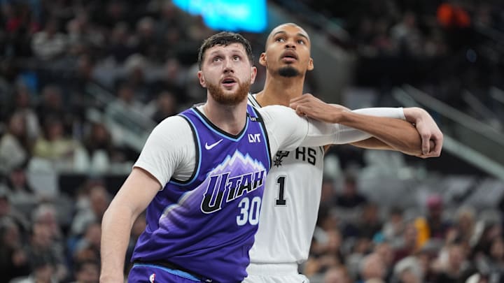 Jan 19, 2026; San Antonio, Texas, USA;  Utah Jazz center Jusuf Nurkic (30) vies for position against San Antonio Spurs forward Victor Wembanyama (1) during the second half at Frost Bank Center. Mandatory Credit: Daniel Dunn-Imagn Images