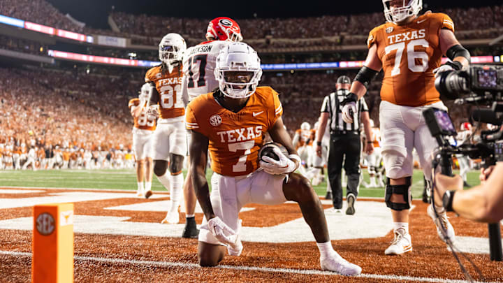 Oct 19, 2024; Austin, Texas, USA; Texas Longhorns wide receiver Isaiah Bond (7) celebrates after securing a two-point conversion against the Georgia Bulldogs in the third quarter at Darrell K Royal-Texas Memorial Stadium. Mandatory Credit: Brett Patzke-Imagn Images Oct 19, 2024; Austin, Texas, USA; Texas Longhorns wide receiver Isaiah Bond (7) celebrates after securing a two-point conversion against the Georgia Bulldogs in the third quarter at Darrell K Royal-Texas Memorial Stadium. Mandatory Credit: Brett Patzke-Imagn Images