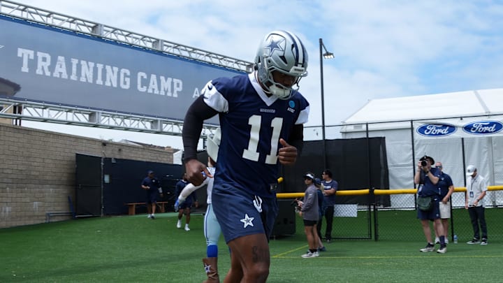 Dallas Cowboys defensive end Micah Parsons enters the field during training camp at the River Ridge Fields. 