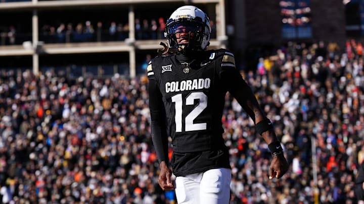 Nov 29, 2024; Boulder, Colorado, USA; Colorado Buffaloes wide receiver Travis Hunter (12) reacts in the first quarter against the Oklahoma State Cowboys at Folsom Field. Mandatory Credit: Ron Chenoy-Imagn Images Nov 29, 2024; Boulder, Colorado, USA; Colorado Buffaloes wide receiver Travis Hunter (12) reacts in the first quarter against the Oklahoma State Cowboys at Folsom Field. Mandatory Credit: Ron Chenoy-Imagn Images