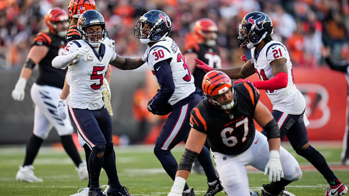 Houston Texans safety DeAndre Houston-Carson (30) celebrates after intercepting a pass in the fourth