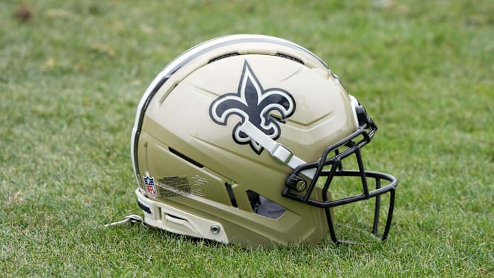 Aug 14, 2025; Carson, CA, USA; A New Orleans Saints helmet on the field during a joint practice against the Los Angeles Rams at the Dignity Health Sports Park. Mandatory Credit: Kirby Lee-Imagn Images Aug 14, 2025; Carson, CA, USA; A New Orleans Saints helmet on the field during a joint practice against the Los Angeles Rams at the Dignity Health Sports Park. Mandatory Credit: Kirby Lee-Imagn Images