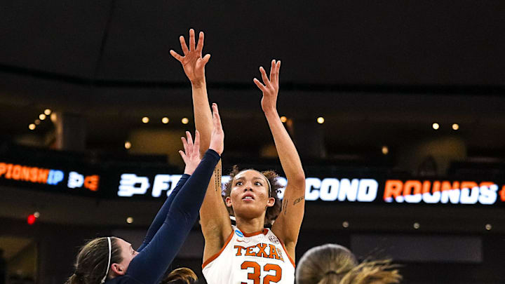 Texas Longhorns guard Ndjakalenga Mwenentanda (32) shoots the ball during the second round NCAA playoff game against Illinois at the Moody Center on Monday, March 24, 2025. Texas Longhorns guard Ndjakalenga Mwenentanda (32) shoots the ball during the second round NCAA playoff game against Illinois at the Moody Center on Monday, March 24, 2025.