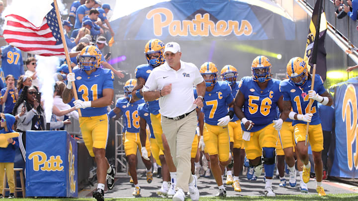 Aug 30, 2025; Pittsburgh, Pennsylvania, USA; Pittsburgh Panthers head coach Pat Narduzzi (middle) leads the team onto the field to play the Duquesne Dukes at Acrisure Stadium. Mandatory Credit: Charles LeClaire-Imagn Images Aug 30, 2025; Pittsburgh, Pennsylvania, USA; Pittsburgh Panthers head coach Pat Narduzzi (middle) leads the team onto the field to play the Duquesne Dukes at Acrisure Stadium. Mandatory Credit: Charles LeClaire-Imagn Images