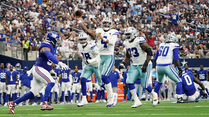 Sep 14, 2025; Arlington, Texas, USA; Dallas Cowboys quarterback Dak Prescott (4) passes the ball against the New York Giants during the second quarter.