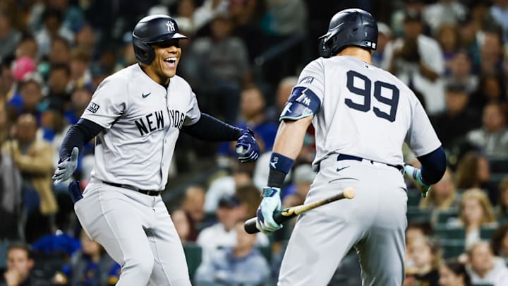 Sep 17, 2024; Seattle, Washington, USA; New York Yankees right fielder Juan Soto (22) celebrates a two-run home run against the Seattle Mariners with designated hitter Aaron Judge (99) during the fourth inning at T-Mobile Park. Mandatory Credit: Joe Nicholson-Imagn Images Sep 17, 2024; Seattle, Washington, USA; New York Yankees right fielder Juan Soto (22) celebrates a two-run home run against the Seattle Mariners with designated hitter Aaron Judge (99) during the fourth inning at T-Mobile Park. Mandatory Credit: Joe Nicholson-Imagn Images