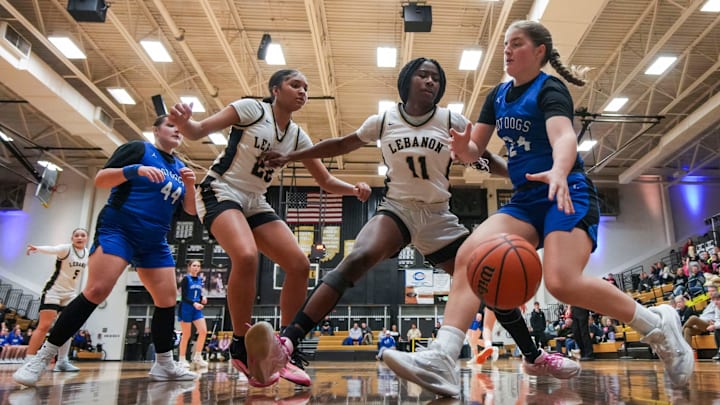 Frankfort Hot Dogs Ava Jarman (24) dribbles to the basket against Lebanon Tigers Heaven Tunstill (11) on Wednesday, Feb. 4, 2026, during a sectional quarterfinals matchup at Lebanon High School in Lebanon, Ind.
