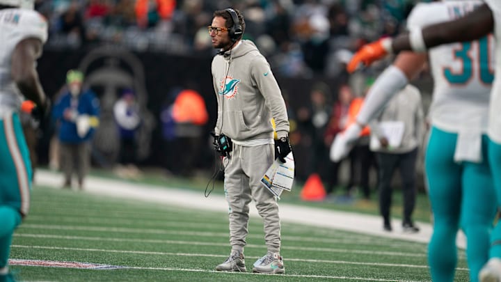 Miami Dolphins head coach Mike McDaniel stands on the field during a week 14 football game between the New York Jets and Miami Dolphins at MetLife Stadium on Sunday, Dec. 7, 2025.