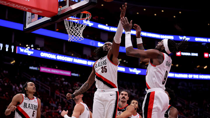 Nov 22, 2024; Houston, Texas, USA; Portland Trail Blazers center Robert Williams III (35) rebounds against the Houston Rockets during the first quarter at Toyota Center. Mandatory Credit: Erik Williams-Imagn Images