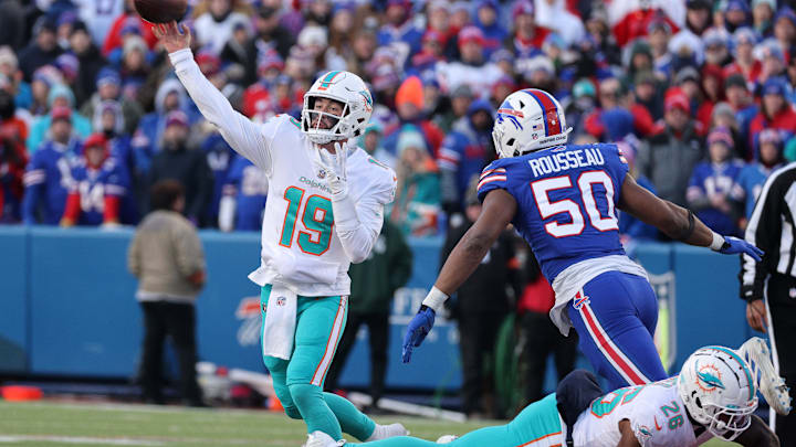 Miami quarterback Skylar Thompson gets rid of the ball before getting hit by Buffalo   s Greg