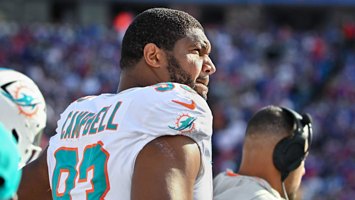 Former Miami Dolphins defensive tackle Calais Campbell (93) on the sideline in a game against the Buffalo Bills at Highmark Stadium. 