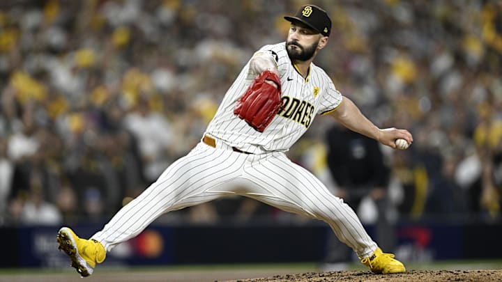 San Diego Padres pitcher Tanner Scott (66) throws in the eighth inning against the Los Angeles Dodgers during the NLDS. San Diego Padres pitcher Tanner Scott (66) throws in the eighth inning against the Los Angeles Dodgers during the NLDS.