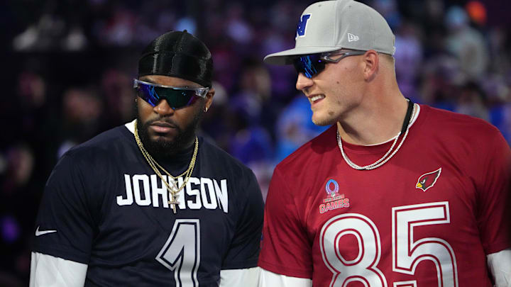 Jaylon Johnson has a talk with Trey McBride at the Pro Bowl games earlier this year, the Bears cornerbacks's second straight appearance there.