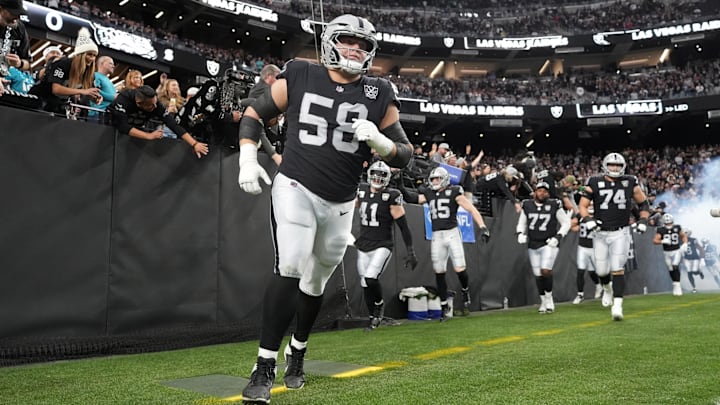 Dec 22, 2024; Paradise, Nevada, USA; Las Vegas Raiders guard Jackson Powers-Johnson (58) enters the field before the game against the Jacksonville Jaguars at Allegiant Stadium. Mandatory Credit: Kirby Lee-Imagn Images