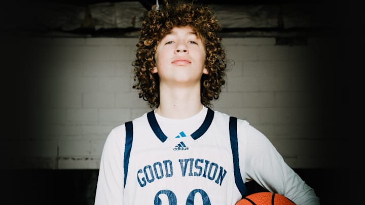 Nelson Neumann (Good Vision Academy) taking basketball pictures for his first high school season.