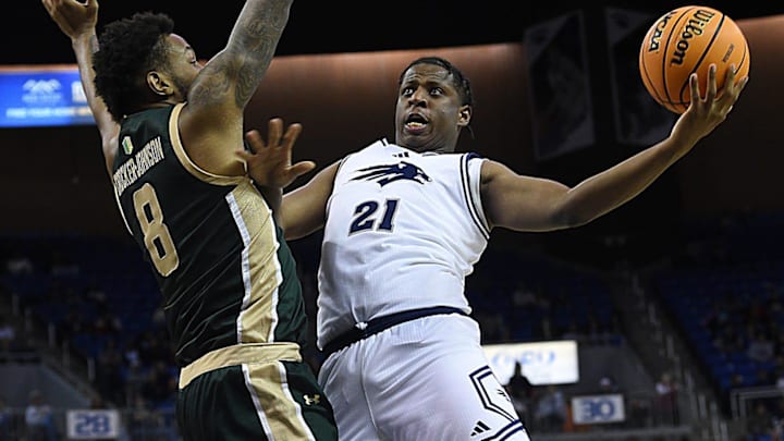 Nevada’s Justin McBride shoots while taking on Colorado State at Lawlor Events Center in Reno on Dec. 21, 2024.