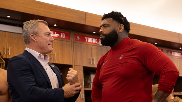 San Francisco 49ers general manager John Lynch (L) and left tackle Trent Williams (L)
