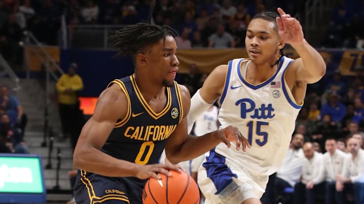 Cal's Jeremiah Wilkinson drives on Pitt's Jaland Lowe 