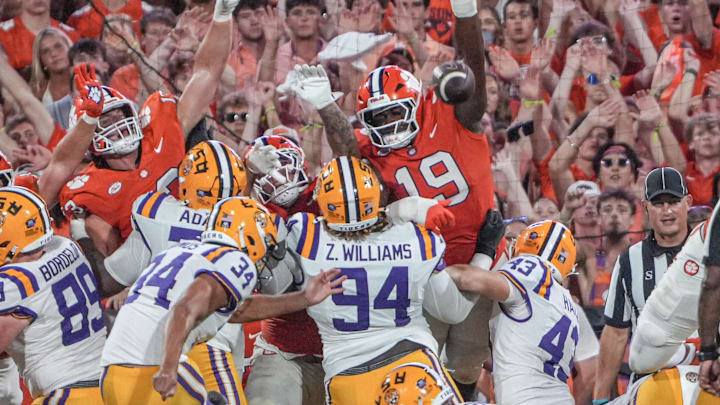 Clemson defensive lineman DeMonte Capehart (19) reaches attempting to block a field goal Louisiana State University kicker Damian Ramos (34) kicked wide during the third quarter at Memorial Stadium in Clemson, S.C. Saturday, August 30, 2025.
