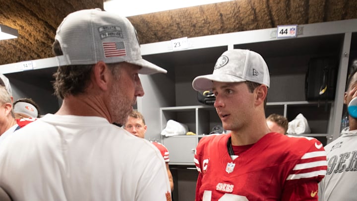 San Francisco 49ers head coach Kyle Shanahan (L) and quarterback Brock Purdy (R)