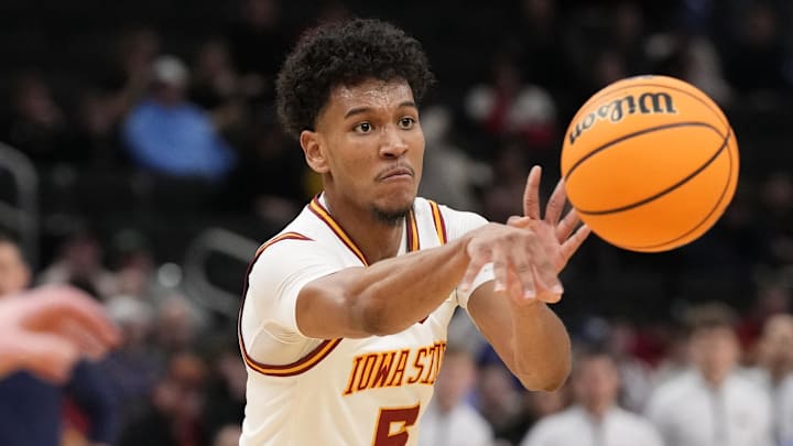 Mar 23, 2025; Milwaukee, WI, USA;  Iowa State Cyclones guard Curtis Jones (5) passes against the Mississippi Rebels during the second half in the second round of the NCAA Tournament at Fiserv Forum.
