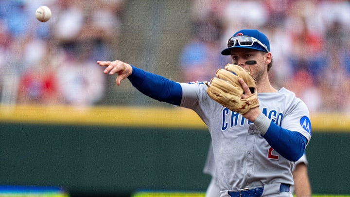Chicago Cubs second baseman Nico Hoerner (2) throws to first for an out in the first inning between Cincinnati Reds and Chicago Cubs at Great American Ball Park in Cincinnati on Sept. 21, 2025.