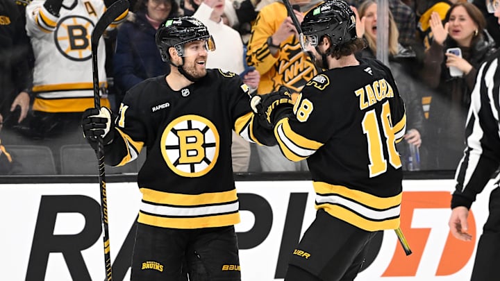 Feb 26, 2026; Boston, Massachusetts, USA; Boston Bruins left wing Viktor Arvidsson (71) celebrates a goal against the Columbus Blue Jackets with center Pavel Zacha (18) during the first period at TD Garden. Mandatory Credit: Eric Canha-Imagn Images
