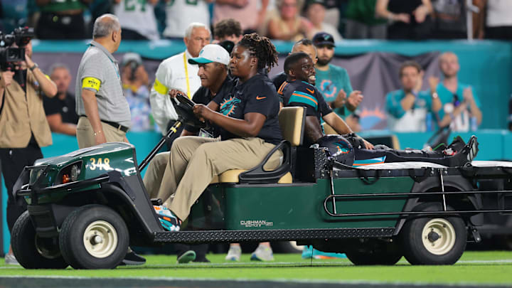 Hill was carted off the field following the injury.
