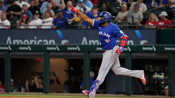 Sep 19, 2024; Arlington, Texas, USA; Toronto Blue Jays first baseman Vladimir Guerrero Jr. (27) reacts after hitting a solo home run during the ninth inning against the Texas Rangers at Globe Life Field. Sep 19, 2024; Arlington, Texas, USA; Toronto Blue Jays first baseman Vladimir Guerrero Jr. (27) reacts after hitting a solo home run during the ninth inning against the Texas Rangers at Globe Life Field.