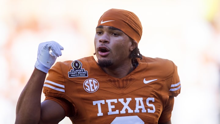 Dec 21, 2024; Austin, Texas, USA; Texas Longhorns wide receiver DeAndre Moore Jr. (0) against the Clemson Tigers during the CFP National playoff first round at Darrell K Royal-Texas Memorial Stadium. Mandatory Credit: Mark J. Rebilas-Imagn Images Dec 21, 2024; Austin, Texas, USA; Texas Longhorns wide receiver DeAndre Moore Jr. (0) against the Clemson Tigers during the CFP National playoff first round at Darrell K Royal-Texas Memorial Stadium. Mandatory Credit: Mark J. Rebilas-Imagn Images