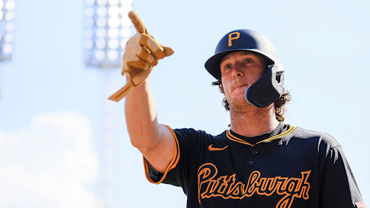 Sep 21, 2024; Cincinnati, Ohio, USA; Pittsburgh Pirates outfielder Billy Cook (28) reacts after hitting a solo home run in the ninth inning against the Cincinnati Reds at Great American Ball Park. Mandatory Credit: Katie Stratman-Imagn Images