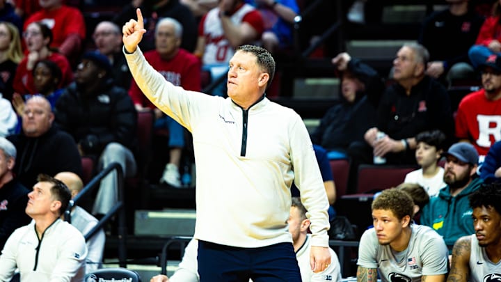Penn State basketball's Mike Rhoades calls out a play to his team during the game against Rutgers on March 8, 2026. Penn State basketball's Mike Rhoades calls out a play to his team during the game against Rutgers on March 8, 2026.