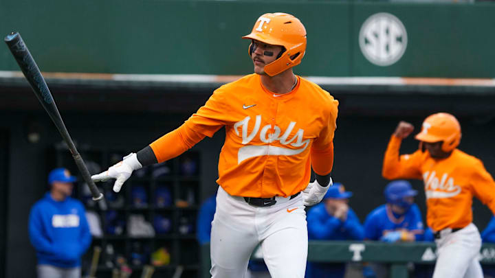 Tennessee's Hunter Ensley (9) flips his bat after hitting a grand slam during a NCAA baseball game between Tennessee and Hofstra at Lindsey Nelson Stadium on Saturday, February 15, 2025. Tennessee's Hunter Ensley (9) flips his bat after hitting a grand slam during a NCAA baseball game between Tennessee and Hofstra at Lindsey Nelson Stadium on Saturday, February 15, 2025.