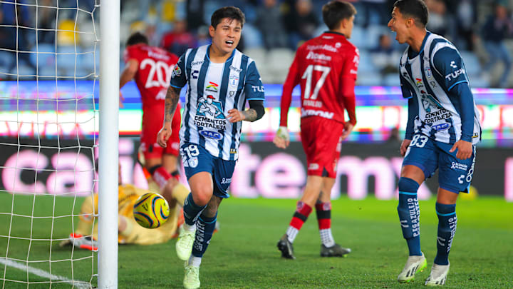 Midweek Matchday in Liga MX: Javier López (left) reacts after scoring the game-winning goal for Pachuca against Atlas.
