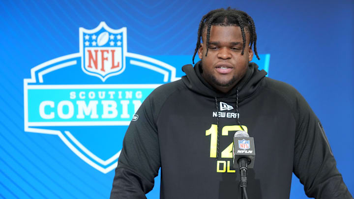 Michigan defensive lineman Kenneth Grant (DL12) during the 2025 NFL Scouting Combine at the Indiana Convention Center. Michigan defensive lineman Kenneth Grant (DL12) during the 2025 NFL Scouting Combine at the Indiana Convention Center.