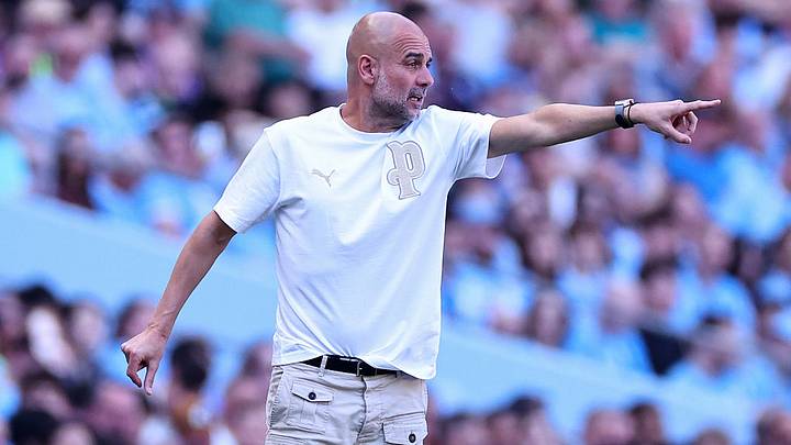 Pep Guardiola looked across Manchester with admiration. Pep Guardiola looked across Manchester with admiration.
