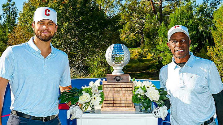 Slade Cecconi and Kenny Lofton pose with the trophy at the inaugural Capital One MLB Open