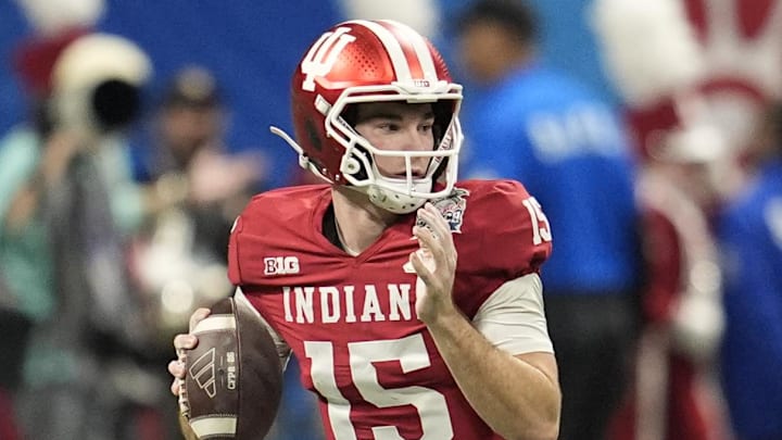 Jan 9, 2026; Atlanta, GA, USA; Indiana Hoosiers quarterback Fernando Mendoza (15) passes against the Oregon Ducks during the first half of the 2025 Peach Bowl and semifinal game of the College Football Playoff at Mercedes-Benz Stadium. Mandatory Credit: Dale Zanine-Imagn Images