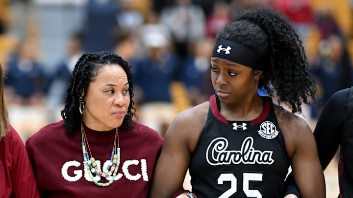 Dawn Staley and Raven Johnson stand together before a game.