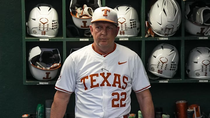 Texas Longhorns head coach Jim Schlossnagle stands in the dugout ahead of the Lone Star Showdown. | 